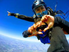 GoPro skydive action footage on a clear day.