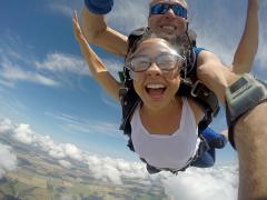 GoPro skydive action footage above the clouds.