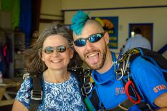 Dallas Skydive Center staff and customer take a picture.