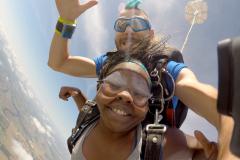 Skydiver smiles for the camera.