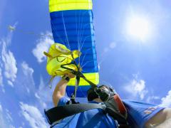 Looking up at the parachute.