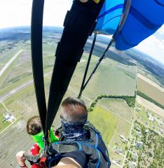 Skydivers approaching the landing zone.