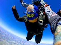 A women skydiver in free fall.